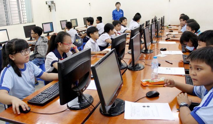 Học sinh tiểu học tham gia một cuộc thi tin học - Ảnh minh họa: Q.NG.